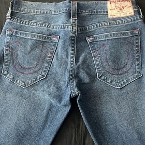relaxed straight men jeans
size 33
red stiching